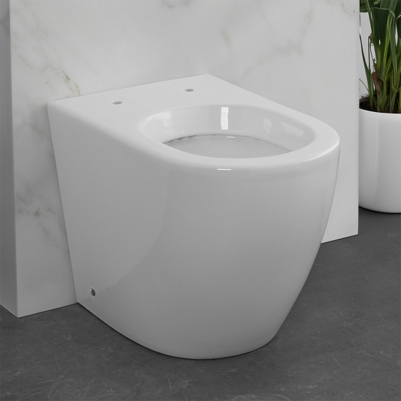 Wc per anziani filomuro H 50 cm con scarico traslato serie Comoda